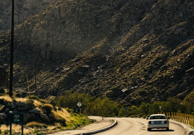 Photo by Ricky Esquivel: https://www.pexels.com/photo/a-car-on-the-road-beside-rocky-mountains-3881273/